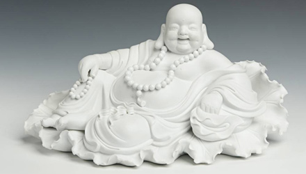 Porcelain figure of Budai or Laughing Buddha 