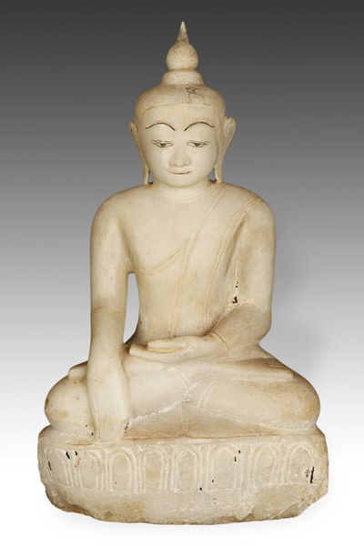 Burmese Buddha with high arched eyebrows and pointed top knot