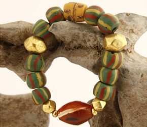 Authentic Spirit wristbrand utilizing antique African trade beads, gold, and carnelian