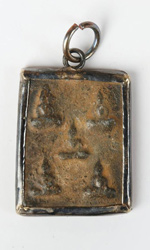 Clay and brass pendant depicting the 5 Dhyani Buddhas