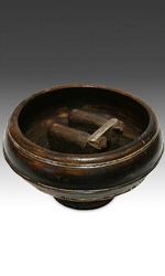 Carved wood and silver chicha bowl, depicting two yoked animals
