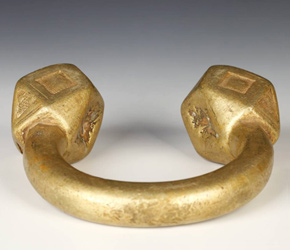 Tuareg brass bracelet currency showing signs of wear over time