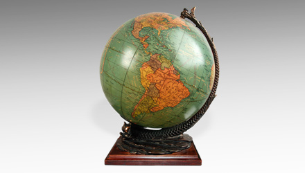 An illuminated crystal and cast iron globe made in Indianapolis, Indiana by the Cram Co.