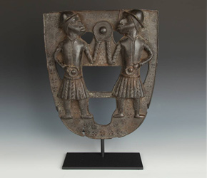 Bronze relief plaque depicting two Portuguese figures in European dress from the Benin people of West Africa