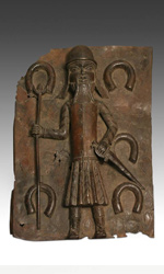 Bronze relief plaque depicting Portuguese soldier with manilla currency, from the Benin people of West Africa