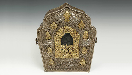 A large, beautifully crafted gold, silver, and copper Tibetan Gao or prayer box with Ashtamangala Motif
