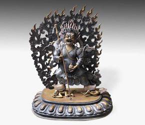 A Tibetan demon shown captured in bronze