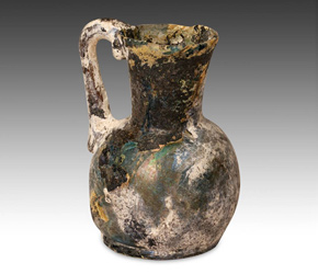 Ancient Islamic hand blown glass vessel from the 8th - 12th C.