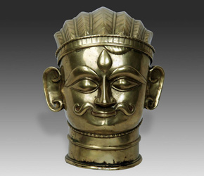 17th C. brass mukha, or face lingam