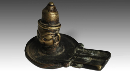 18th C. mukha or face Shiva lingam with yoni