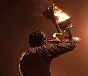 Indian priest performing religeous ceremony or fire puja