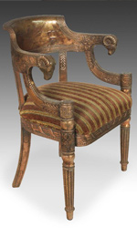 Copper-clad and upholstered armchair with rams head motif from Rajasthan, India