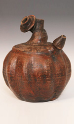 Kendi water vessel with coiled neck and spout