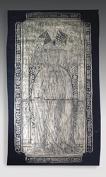 Brass rubbing of robed figure with dog