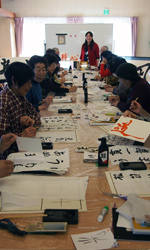 Seiren Chiba at her volunteer calligraphy workshops for the victims of the Fukushima disaster