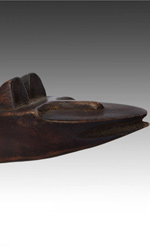 A carved wood headrest by the Dinka people of Sudan, East Africa
