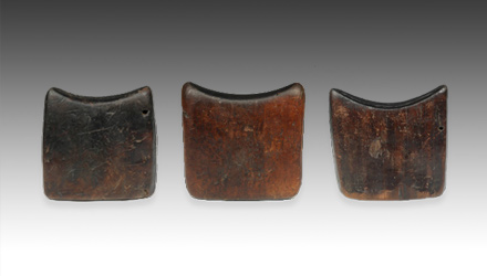 A carved wood headrest by the Dinka people of Sudan, East Africa