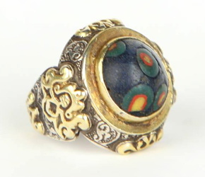 Sterling and gold wash ring with ancient folded glass 'Buddha Bead,' from Afghanistan