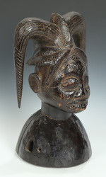 Helmet mask depicting Eshu, known as the 'Guardian of the Crossroads'
