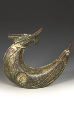 Japanese iron depicting a stylized dragon