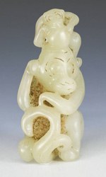 Chinese jade toggle depicting two monkeys
