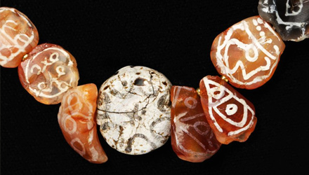 Necklace composed of excavated etched agate and beads from the Bronze Age Necklace composed of etched agate and beads from the Bronze Age