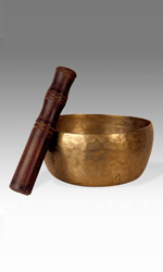 Hand hammered Panchaloha (five-metal) singing bowl with mallet from India