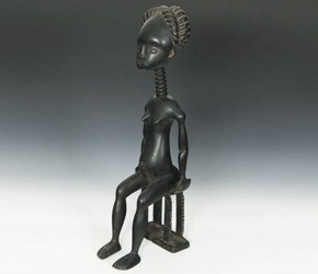 Carved wood Female Figure on Stool from the Ashanti people of Ghana, West Africa