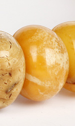 Amber is fossilized tree resin, living material arrested in time after millions of years