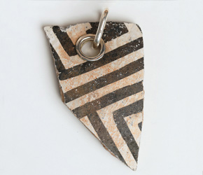 Pendant made from Anasazi pottery shard Pendant made from Anasazi pottery shard