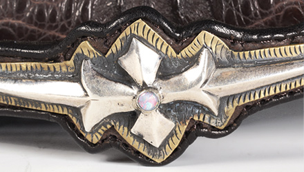 Darling Clutch, composed of crocodile and ostrich hide, gold, silver, horn and opal (detail)