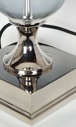 The nickel plated brass base is polished to a mirror finish