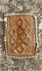 The love knot is hand-carved in fossilized mammoth tusk and set in a sterling silver locket