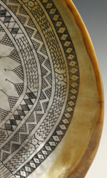 Tikam beautifully engraved with geometric patterns