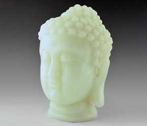 Head of the Buddha carved in white jade