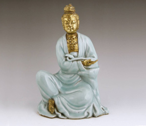 Gilded celadon porcelain figure of Quan Yin