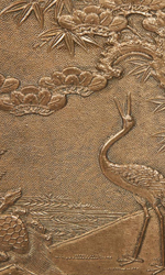 This kagami depicts the classic mofit of a tortuise with two cranes