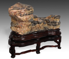 Gongshi, or 'spirit stone' on carved base