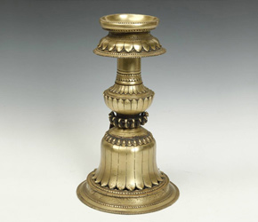 Brass candle holder with lotus motif Brass candle holder with lotus motif