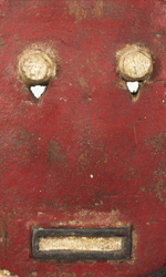 The red Kple Kple mask is considered female and the black, male