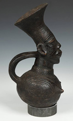 This vessel depicts a Mangbetu woman with an elongated head and sculpted hairdo – both symbols of tribal prestige