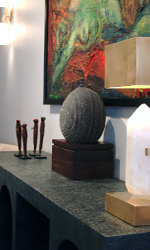 The cast resin and plaster Roxbury Console fuses perfectly with PRIMITIVE's one-of-a-kind fine-art and antiques