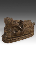 Ganesh is normally shown in a seated posture making this depiction unusual