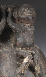 This vessel is adorned with a Female and Male Monkey