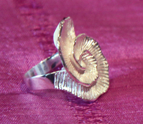 Ring with spiral floral motif Ring with spiral floral motif