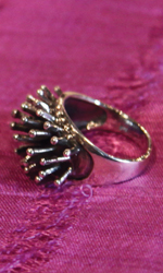 Ring with spiked star cluster motif Ring with spiked star cluster motif