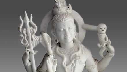 Shiva depicted with multiple arms and trident