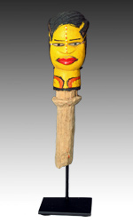 Many Kebe-kebe puppets are etched with scarification marks, and are commonly colored red and white 