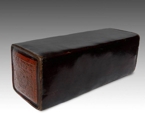 This 19th C. Chinese pillow is composed of lacquered leather